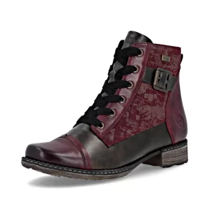 Botte courte pour femme Remonte. Doublure en mini velour pour couper l’humidité. Ajustable grâce aux lacets et enfilable rapidement grâce au fermoir éclair latéral. Semelle intérieur amovible pour insérer votre semelle orthopédique si besoin