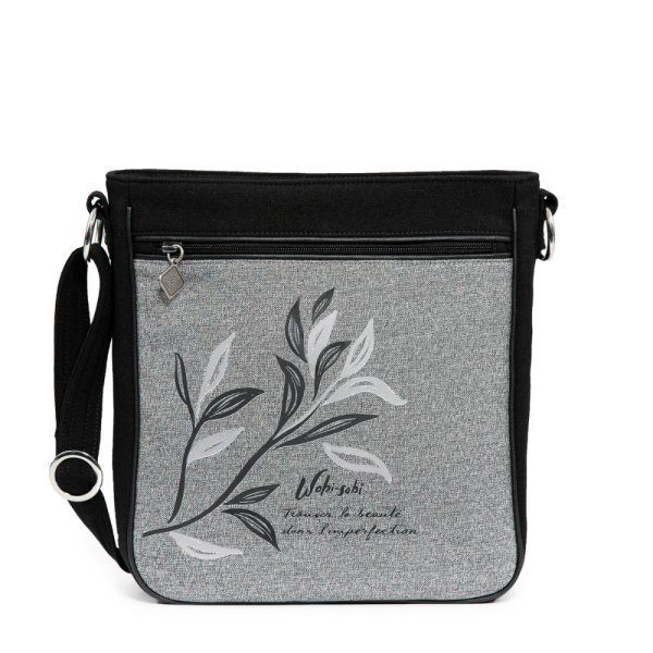 Sac à bandoulière pour Femme prêt-à-oser de Jak's. Sangle ajustable pleine longueur. Lavable à la machine. Dimensions 23 X 26 X 9 Cm.