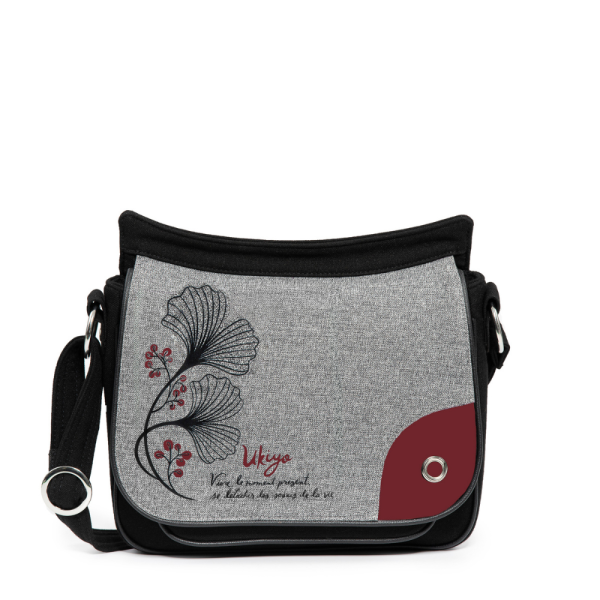 Sac à bandoulière pour femme prêt-à-oser Jak's. Sangle ajustable pleine longueur. Compartiment organisationnel pouvant même remplacer le porte-feuille. Lavable à la machine Dimensions 25 X 19 X 8 cm