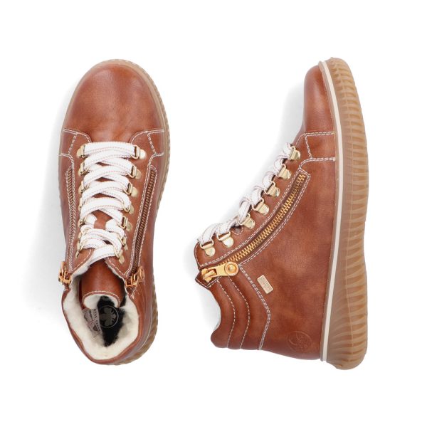 Botte hiver courte pour femme de la marque Rieker. Doublure généreuse. Fermeture éclair latérale pour faciliter l’enfilage en plus de lacets pour un ajustement personnalisé. Le meilleur des 2 mondes en tout temps.