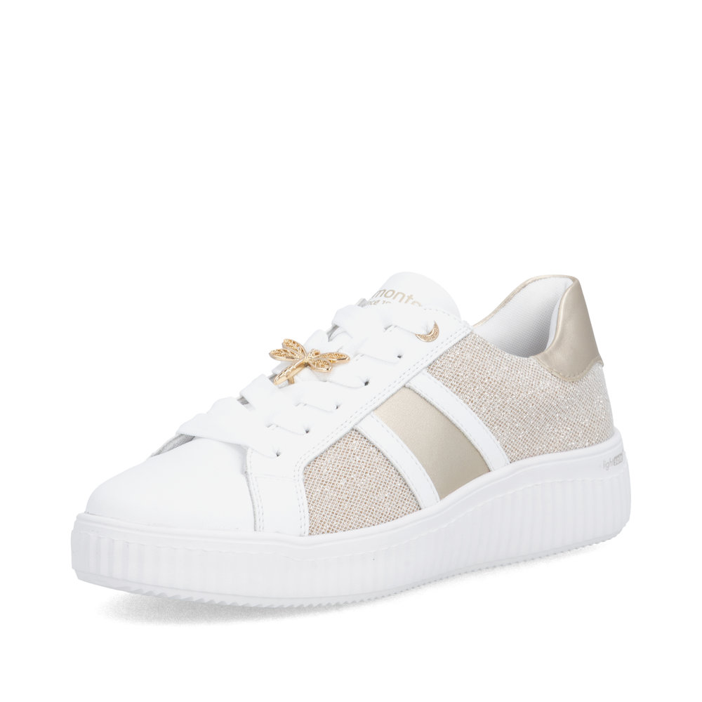 Baskets blanches à semelle plateforme – libellule dorée Apporte une touche chic et lumineuse à ton quotidien avec ces baskets blanches plateforme ultra stylées. Leurs lignes modernes et la libellule dorée sur les lacets apportent un détail raffiné et féminin, parfait pour un look urbain et tendance… sans effort. Confortables et polyvalentes, elles s’accordent aussi bien avec un jeans, une robe ou un pantalon plus habillé. La semelle blanche épaisse offre une belle hauteur tout en assurant une marche stable et agréable. ✨ Style sans effort, confort en tout temps… pour te sentir au top tout simplement. Détails du produit : Chaussure type sneaker / basket femme Couleur : blanc avec détails dorés Semelle plateforme blanche confortable Détail chic : libellule dorée sur les lacets Style : urbain, chic décontracté, moderne Idéale pour : marche, travail, sorties, quotidien Semelle amovible pour insérer une semelle orthopédique 💛 Un incontournable pour un look lumineux et pratique en toute saison. 📦 Livraison gratuite au Canada dès 80$ avant taxes. 👟 Commandez dès maintenant et laissez briller votre style !