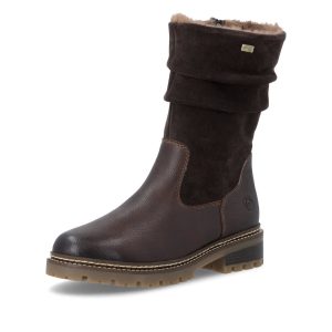 La **Remonte D0B80-25** est une **botte d’hiver pour femme en cuir brun** qui combine chaleur, confort et adhérence. Avec sa membrane **RemonteTEX déperlante**, sa **largeur confort G**, sa doublure chaude et sa semelle intérieure amovible, elle est pensée pour les vraies journées d’hiver. **Cuir véritable | Largeur confort G | RemonteTEX | Semelle amovible**