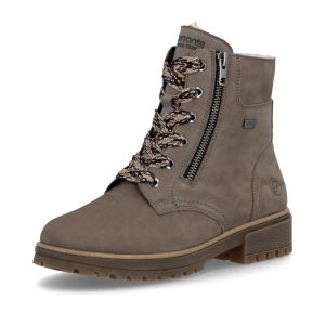 La Remonte D3W70-42 est faite en suède gris avec une coupe extra-large de largeur H. Sa doublure chaude en laine aide à garder les pieds confortables lorsque la température descend, tandis que la membrane RemonteTEX offre une protection contre l’humidité. Elle s’enfile facilement grâce à sa fermeture éclair et sa semelle intérieure amovible peut laisser la place à certaines orthèses. Son talon bloc de 40 mm donne un peu de hauteur tout en conservant une bonne stabilité. Dessus en suède gris Coupe extra-large, largeur H Membrane RemonteTEX résistante à l’eau Doublure chaude en laine Semelle intérieure amovible Compatible avec certaines orthèses Fermeture éclair pratique Talon bloc stable de 40 mm Semelle extérieure flexible et adhérente Une vraie botte d’hiver, mais sans le look « je pars déneiger l’entrée ». 😅