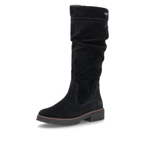 Une belle botte haute noire qui fait aussi de la place aux pieds larges? Oui, ça existe! La Remonte D3W71-02 combine l'élégance du suède noir et le confort qu'on recherche pour affronter les journées froides. Pourquoi on l'aime? Largeur H extra-large : plus d'espace pour les pieds larges. Suède véritable : un look chic et intemporel. Doublure chaude : pour les journées fraîches d'automne et d'hiver. Membrane RemonteTEX : déperlante et respirante. Semelle intérieure amovible : intéressante pour les orthèses, selon leur volume. Fermeture éclair latérale : pratique pour enfiler la botte. Avec sa tige haute d'environ 36 cm et son talon bloc de 4 cm, elle accompagne aussi bien une robe qu'un pantalon ajusté. Une botte élégante, chaude et surtout pensée pour le confort!