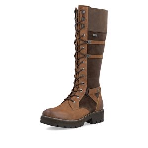 Une botte haute brune qui est belle ET pensée pour l’hiver! La Rieker Y8101-25 mélange différentes teintes de brun et de cognac pour un look vraiment chaleureux. Ses lacets permettent de l’ajuster à la jambe, tandis que la fermeture éclair te simplifie la vie au quotidien. Elle est chaude, munie de la membrane RiekerTEX et possède une semelle intérieure amovible. Botte haute | RiekerTEX | Doublure chaude | Semelle amovible | Lacets + zip